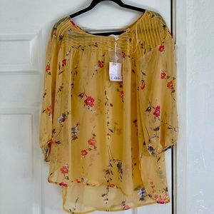 Yellow sheet floral blouse.